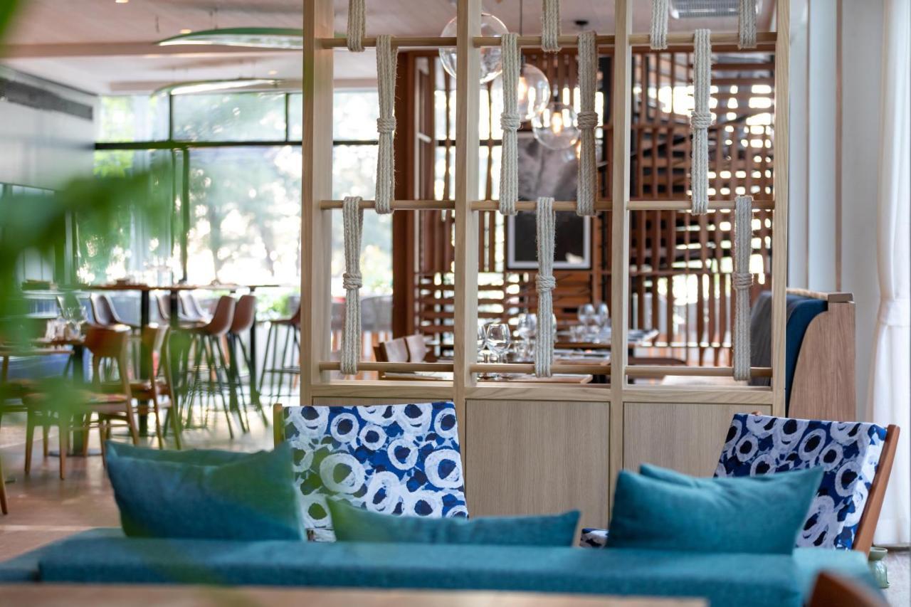 Outrigger Surin Beach Resort - Sha Extra Plus Εξωτερικό φωτογραφία The restaurant