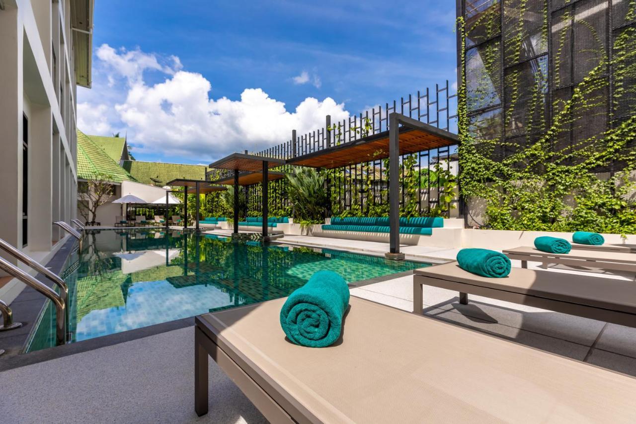 Outrigger Surin Beach Resort - Sha Extra Plus Εξωτερικό φωτογραφία The swimming pool at the hotel