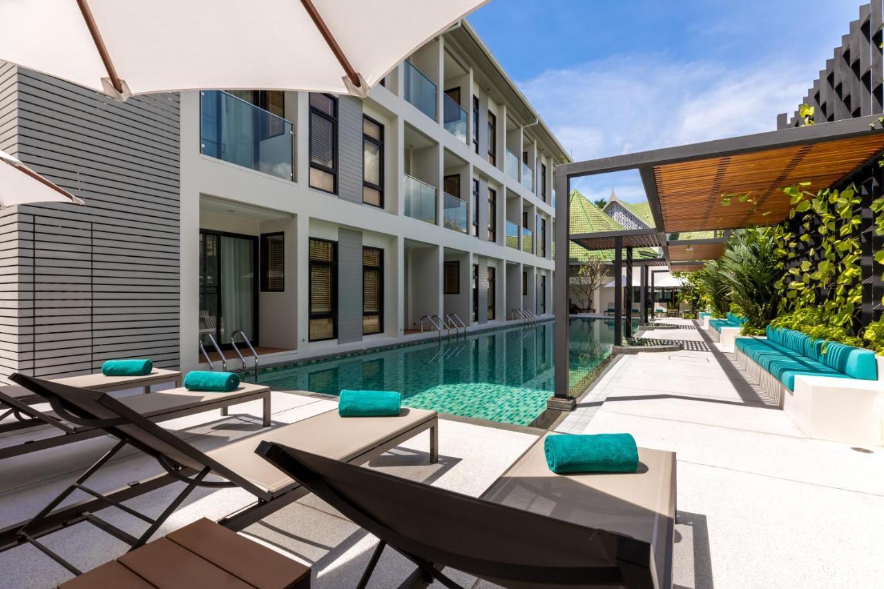 Outrigger Surin Beach Resort - Sha Extra Plus Εξωτερικό φωτογραφία The swimming pool at the hotel